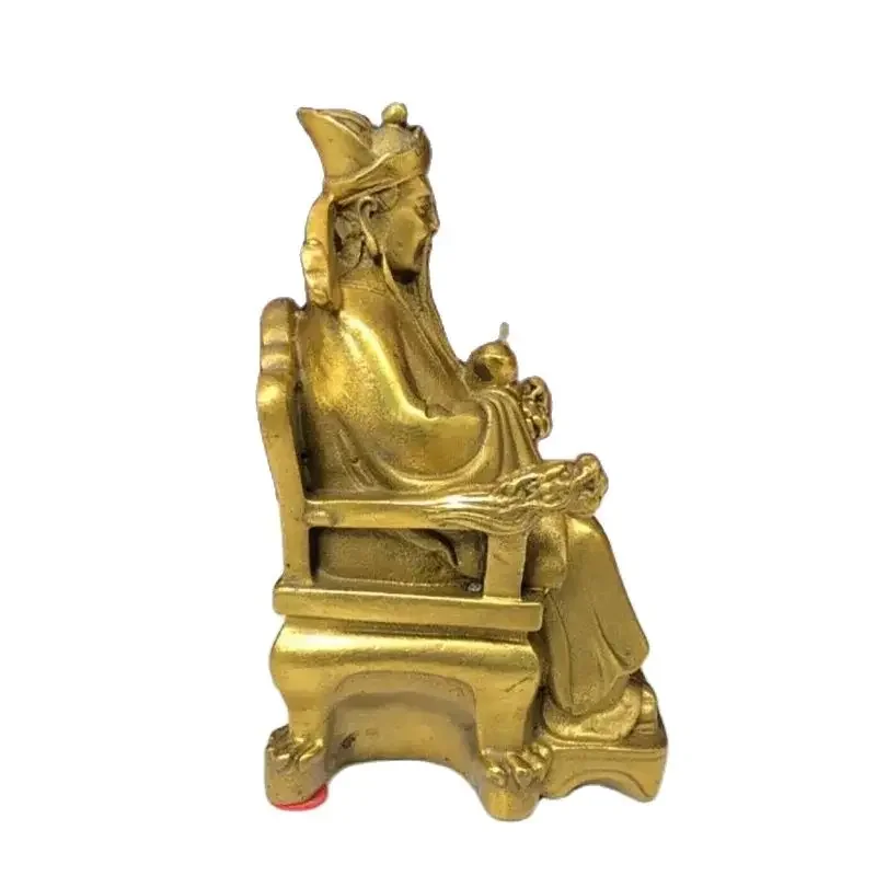 Exquisite brass God of Wealth home decoration in the living room, brass figure Buddha statue sitting on a dragon chair, gold in