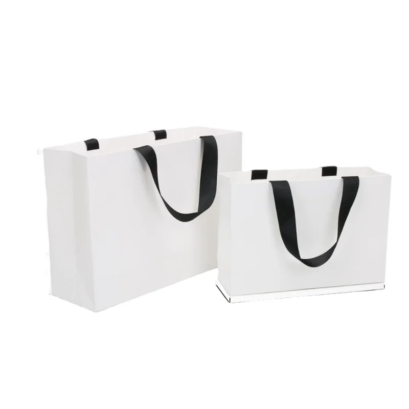 10 pz 250g sacchetto di imballaggio in cartone bianco di alta qualità regalo abbigliamento borsa Shopping sacchetto di carta portatile personalizza