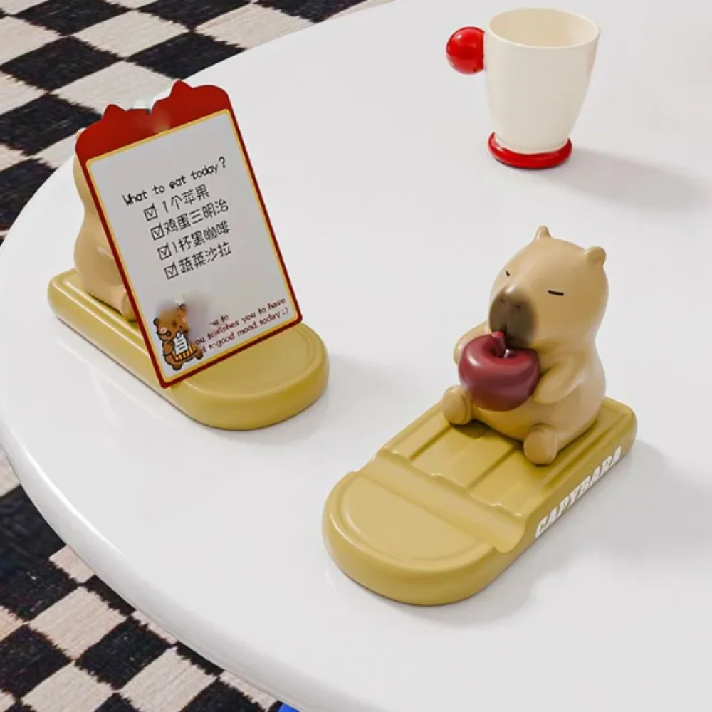 فنجان القهوة كابيبارا حامل هاتف تماثيل صغيرة على شكل حيوانات زخرفة كابيبارا حامل هاتف المحمول الراتنج الإبداعية كابيبرا نموذج