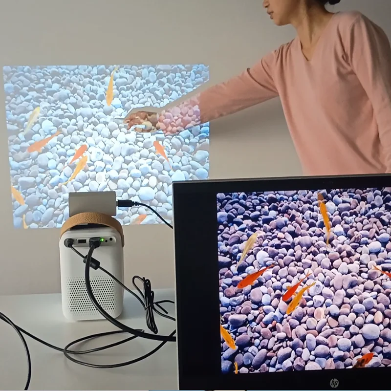 جهاز عرض المسرح المنزلي الذكي يدعم التفاعل القلم عالي الدقة للأطفال جهاز عرض صغير للمسرح المنزلي التعليمي