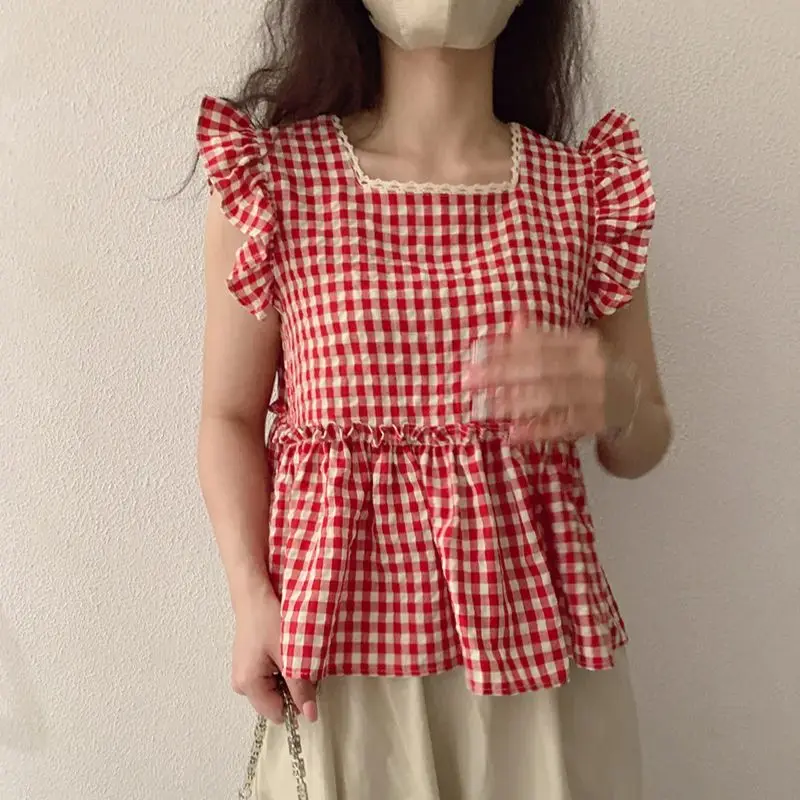 2025 ฤดูร้อนใหม่เผ็ดสาวอารมณ์อเนกประสงค์หลวมสบายๆลาดไหล่หนึ่งไหล่ลายเสื้อยืดผู้หญิงด้านบน