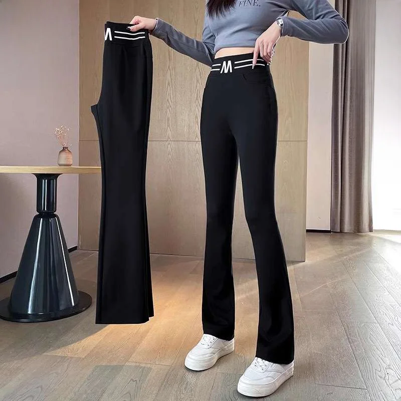 春秋の女性のカジュアルなフレアパンツロングナインポイントカプリパンツ快適なルーズフィットストレートレッグパンツ