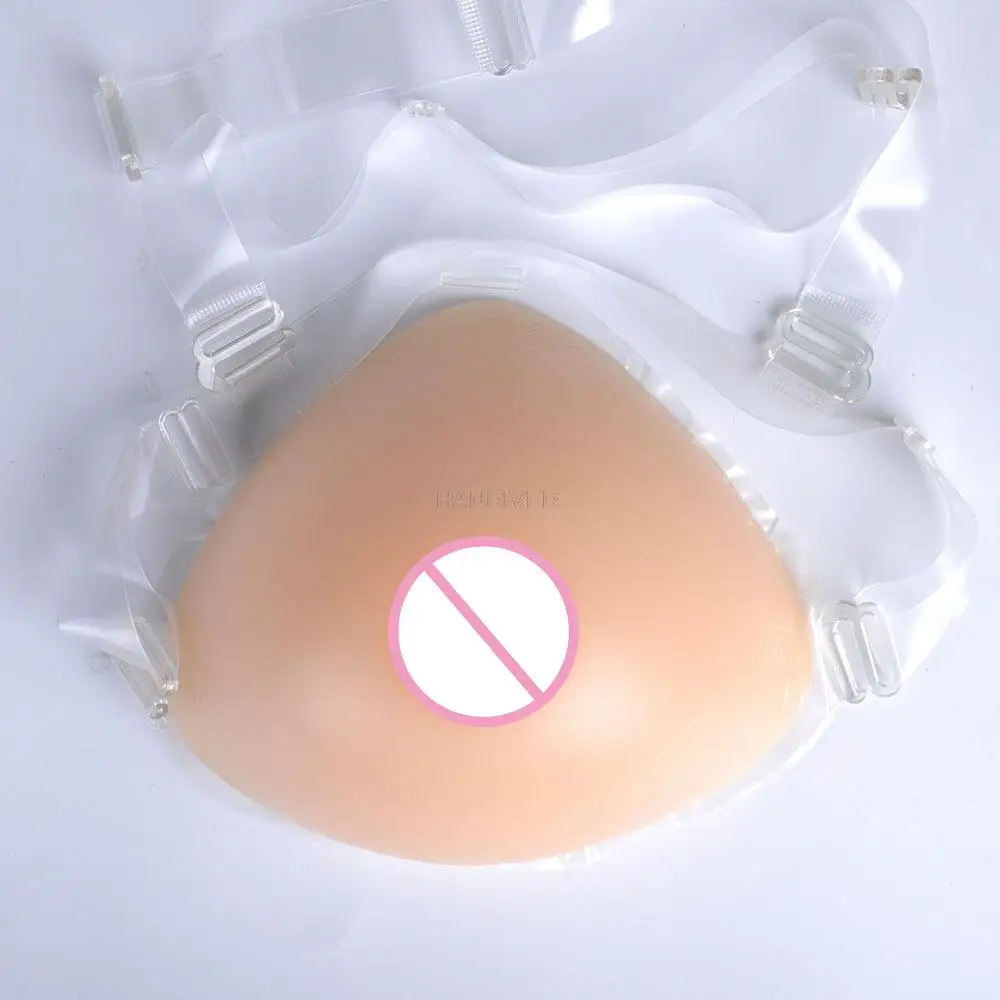 Triangle integrated silicone breast implant with single breast strap