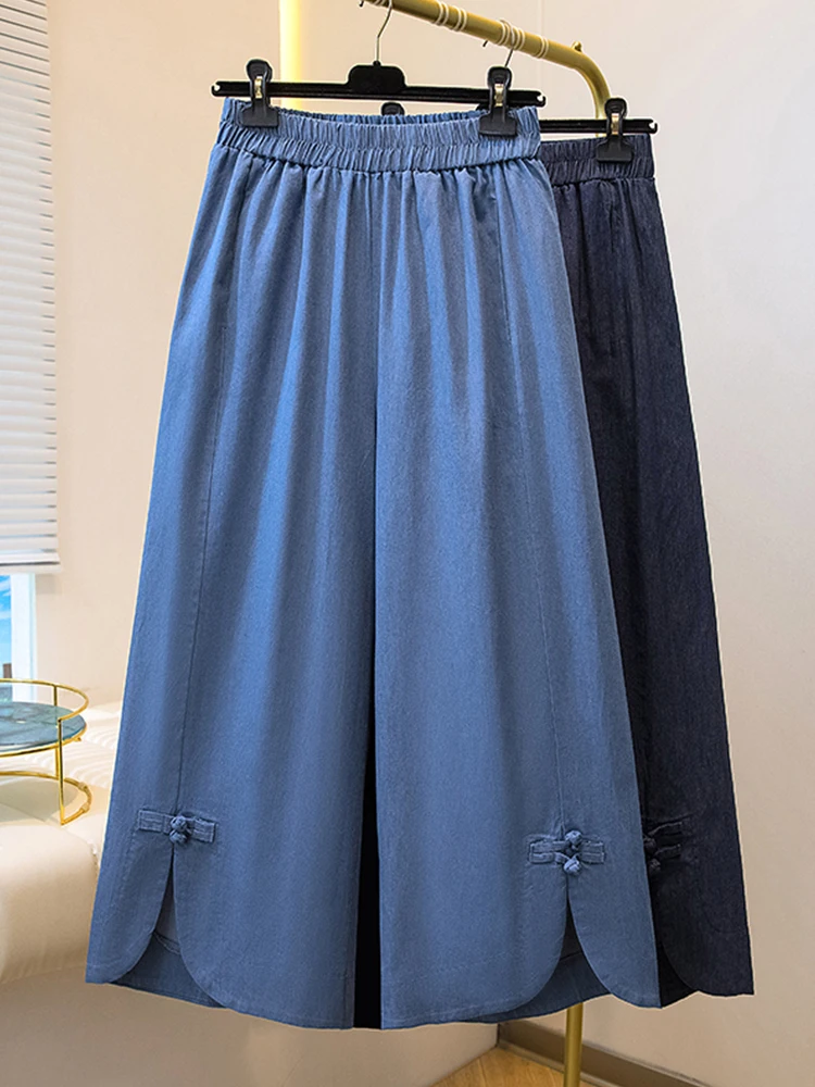 

Новые китайские широкие джинсы для женщин больших размеров с эластичным поясом, брюки длиной 7/8 с пуговицами, свободный крой, прямой силуэт