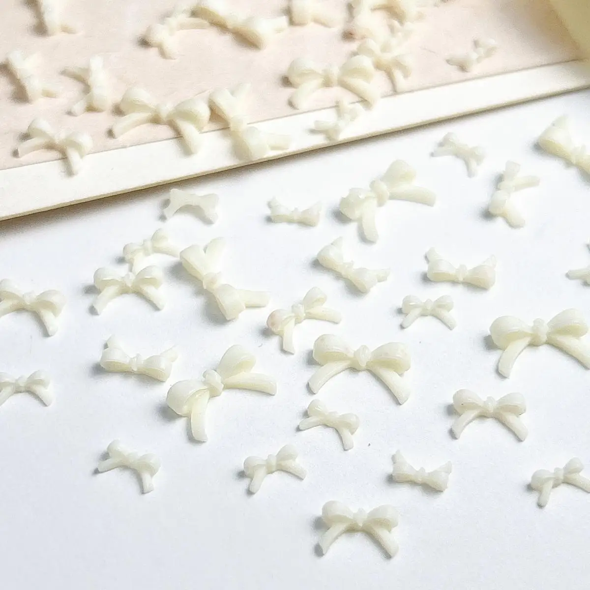 100PCS Fresh Light Yellow Mini Bow Nail Art Decoration Accessories 3D Resin 3-size Bow Nail Charms Supplies for Manicure DIY - Image 6