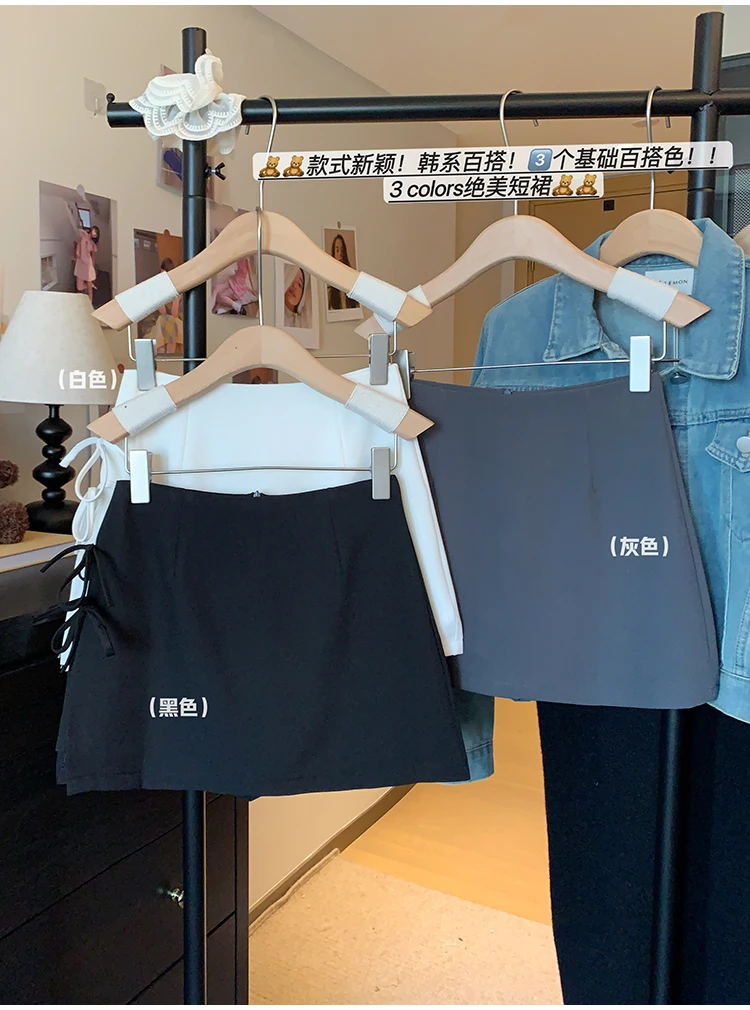 Vrouwen woon-werkverkeer boog halve rok met vetersluiting zijsplit sexy minirok rits casual tas billen A-lijn rok zomer