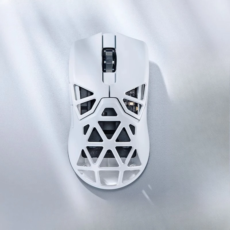 

White magnesium alloy hollow wireless gaming mouse