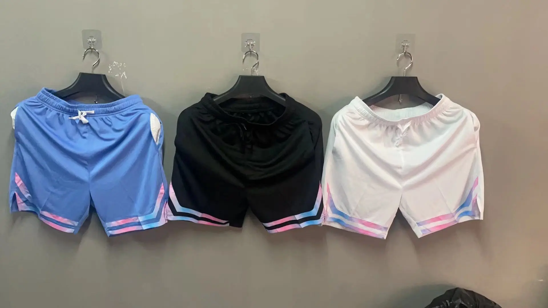 Męskie spodenki kieszonkowe elastyczne oddychające sportowe szorty do biegania trening na świeżym powietrzu Fitness krótki Sweatpant luźne plażowe szorty do koszykówki — zdjęcie 5