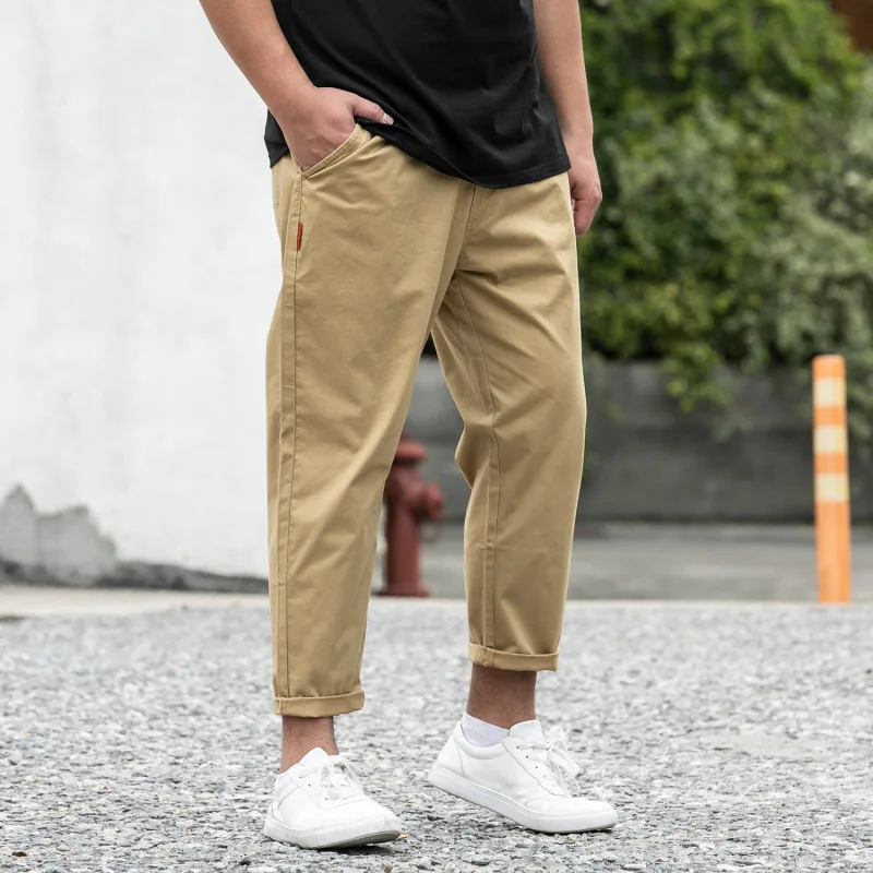 Autumn new men's plus size stretch casual pants 9XL 8XL 7XL fashion men's zipper pocket loose solid color pants.