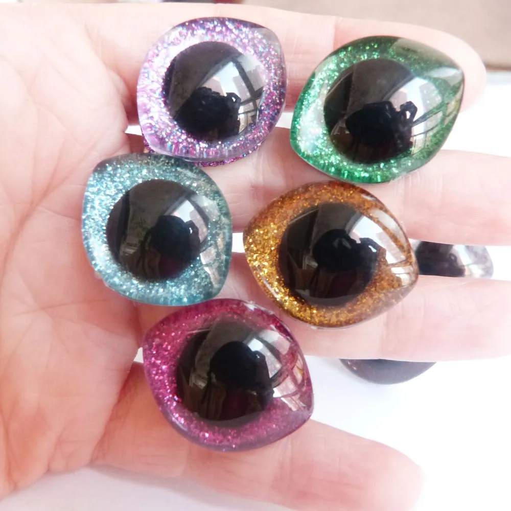 

100pcs/lot 28x23mm 20x23mmOval design trapezoid plastic clear safety toy doll eyes + glitter Nonwovens + washer--color option