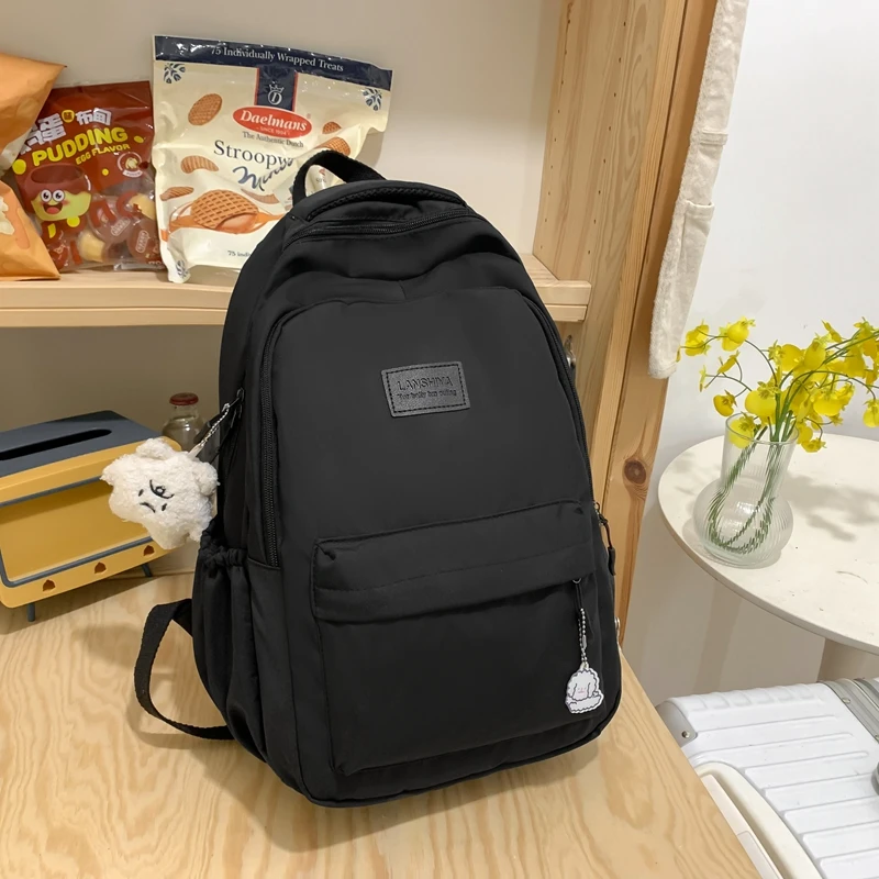 Mochila de color sólido de gran capacidad para estudiantes de secundaria, mochila de viaje negra simple para estudiantes de secundaria