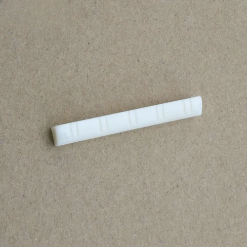 Imagen 2 del producto Tuerca de hueso profesional de 10 cuerdas | Sillín de guitarra Pure Ox Bone para instrumento de 10 cuerdas | Grado Luthier