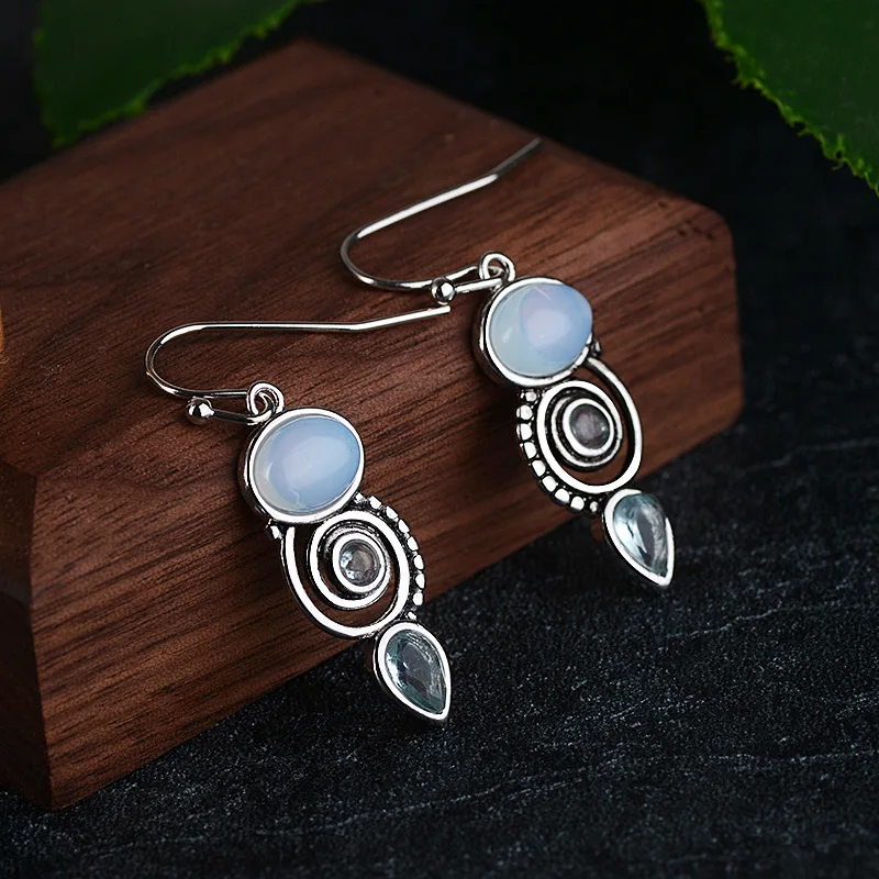 Trendy S925 Sterling Silver Stud Earrings With Inlaid Sea Blue Stones Creative Rotating Water Drop Pear Shaped Design For Women