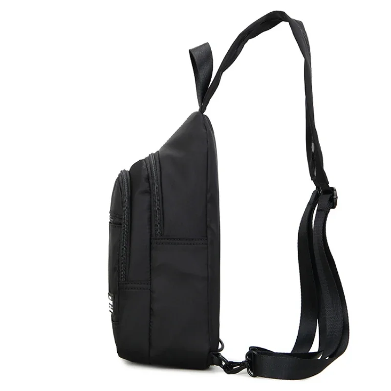 Mini Mochila pequeña de lona para hombre, bolso escolar de hombro, impermeable, para viaje, color negro, 2023