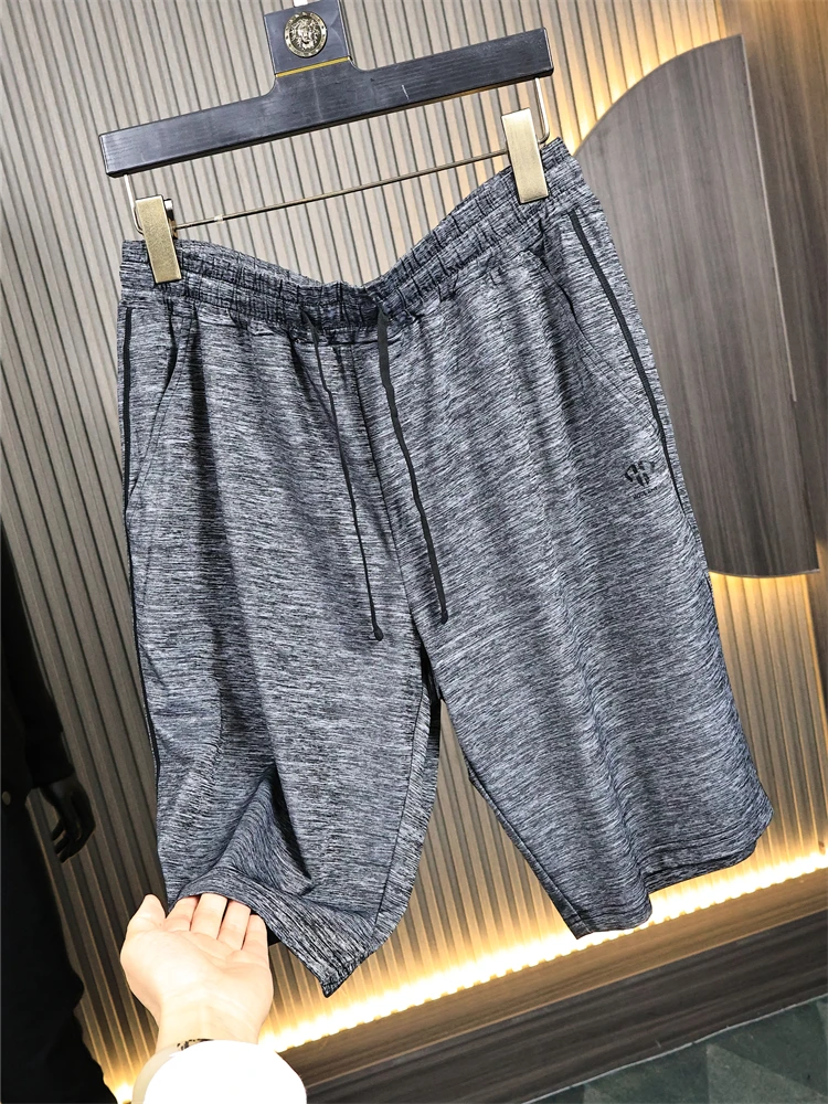 

Мужские модные спортивные брюки с цветочным принтом, быстросохнущие, влагоотводящие, летние, повседневные, свободного кроя, молодежные, тонкие леггинсы