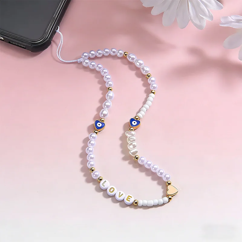 Bohemian style pearl mixed with devil\'s eye love woven phone chain