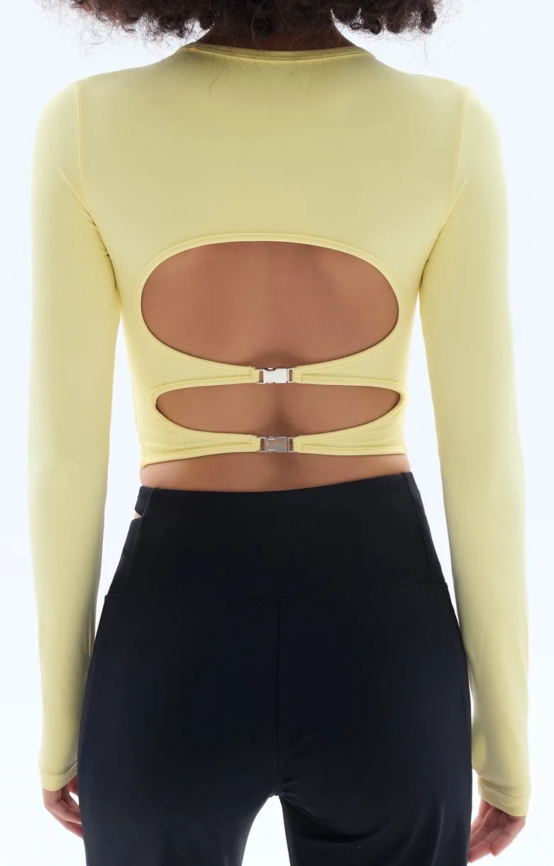 Hollow out fixed chest cushion yoga suit long sleeved high-end tight sports top
