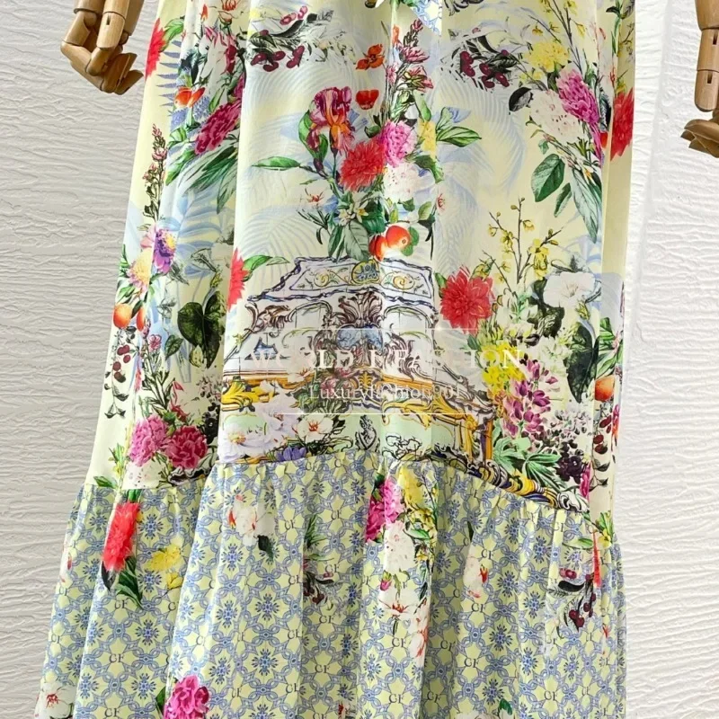 Abito lungo senza maniche con stampa floreale gialla a farfalla in seta 2025