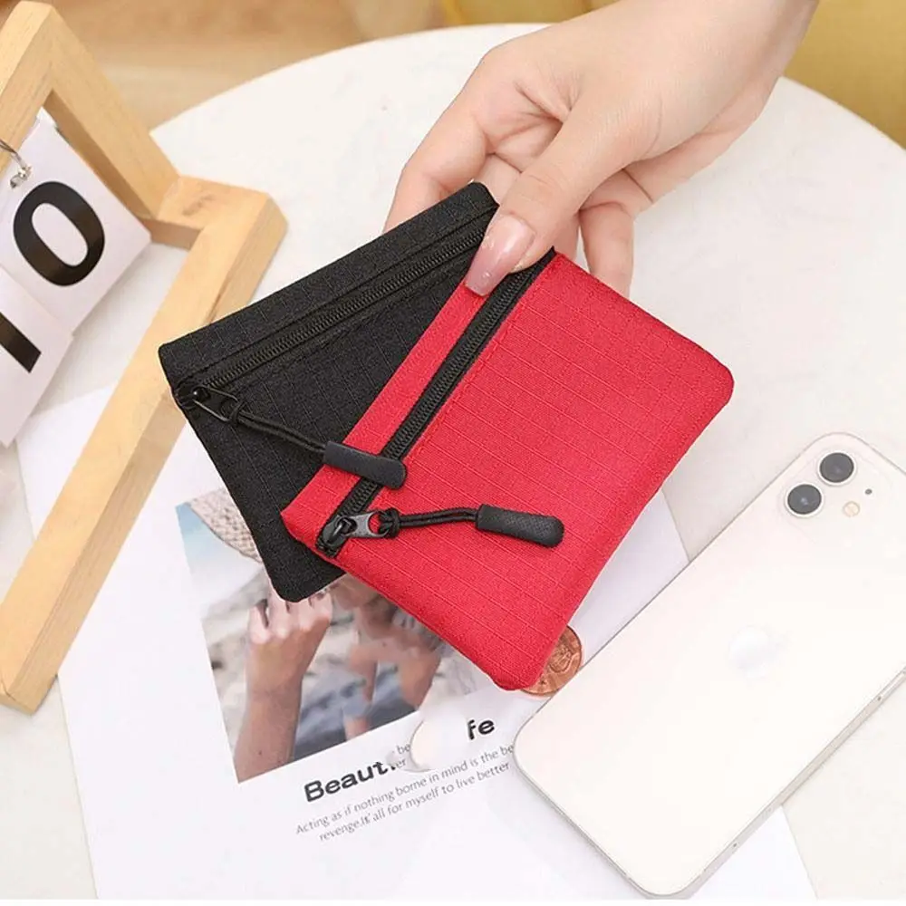 Monedero pequeño de tela Oxford con cremallera Unisex, bolsa de almacenamiento de tarjetas impermeable de Color sólido, bolsillo para monedas, carteras, artículos pequeños