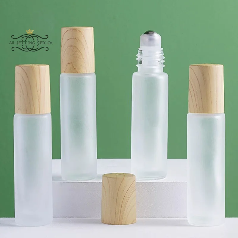 5ml10ml Frosted แก้วขวดลูกกลิ้งไม้พลาสติกสําหรับน้ํามันหอมระเหย Roll-On ขวดลูกกลิ้งสแตนเลส