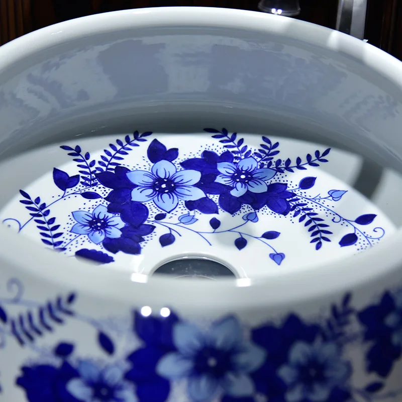 Hand-painted blue-and-white porcelain and ceramics integrated bathroom with washbasin