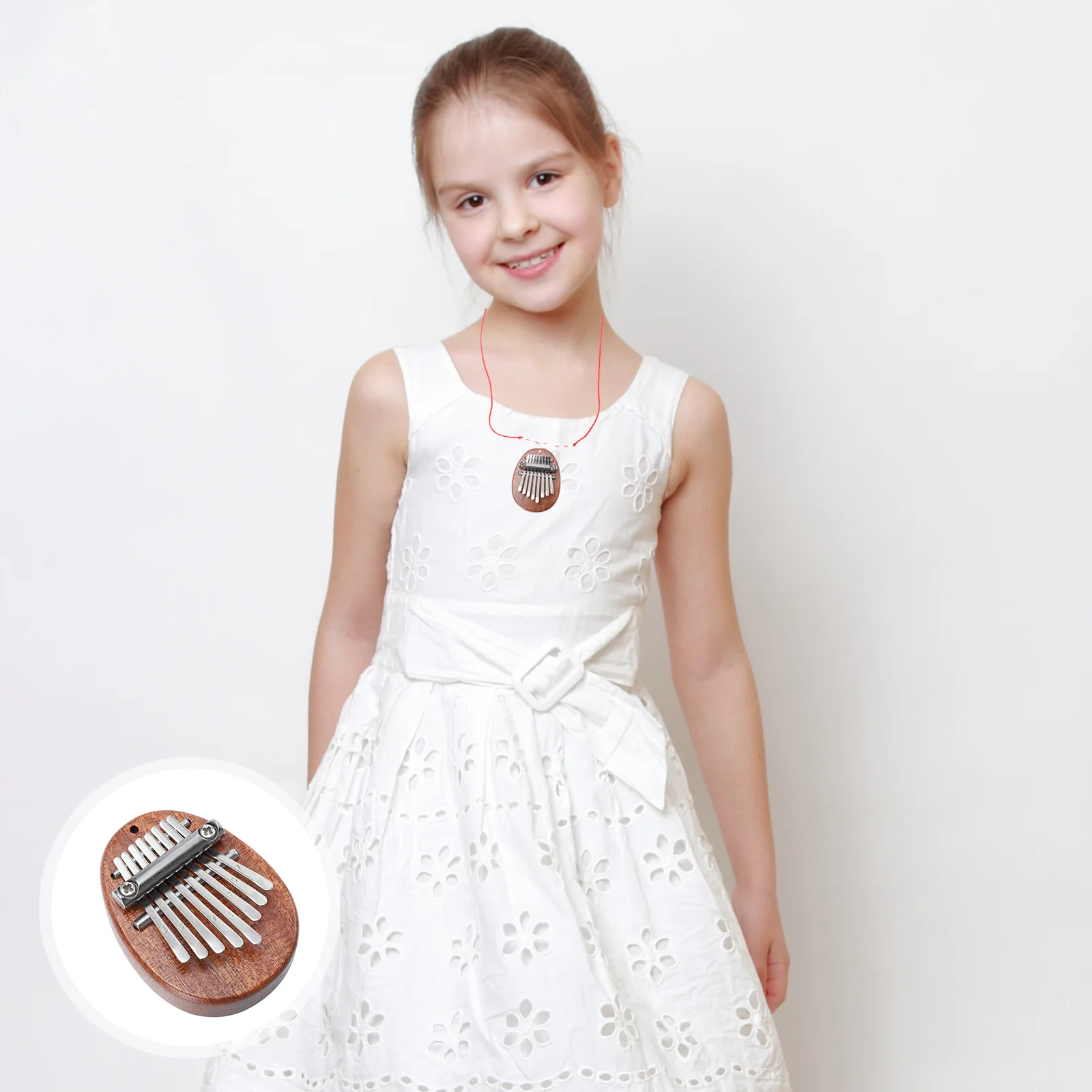

Solid Wood Water Drop Thumb Piano Kids' Musical Instrument Portable Mini Stainless Steel