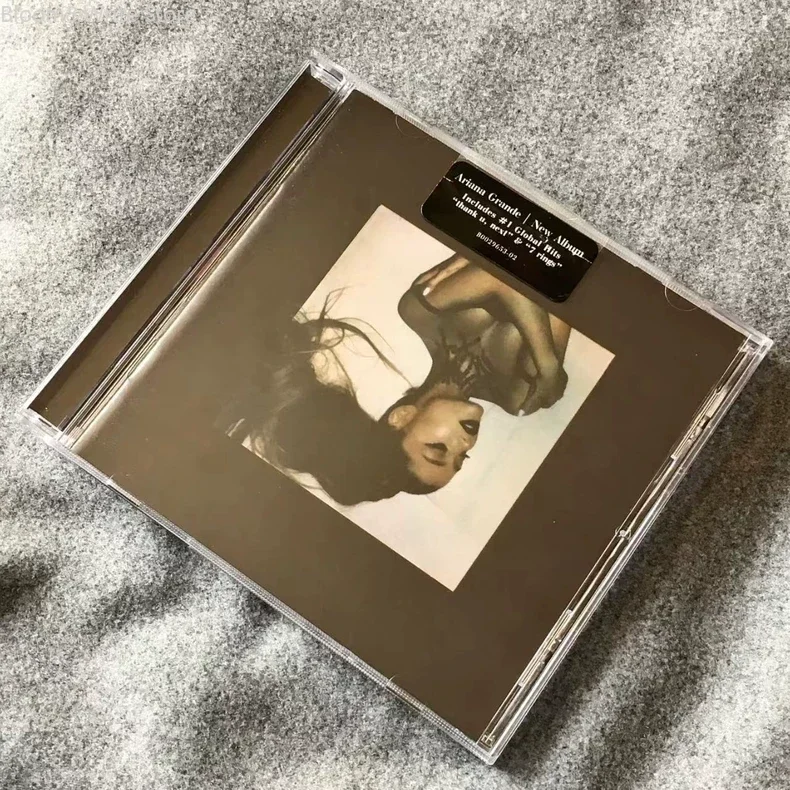 

Классический музыкальный CD-диск Арианы Гранде: альбомы "Thank U, Next", "7 Rings", компакт-диски для Walkman, автомобильных CD-плееров, саундтреков, коллекционные боксы