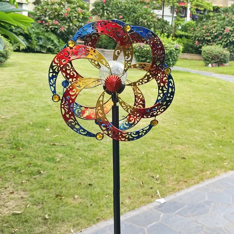Outdoor wrought iron windmill with lamp decoration, seaside playground, park scenic spot, rotating garden art ornament