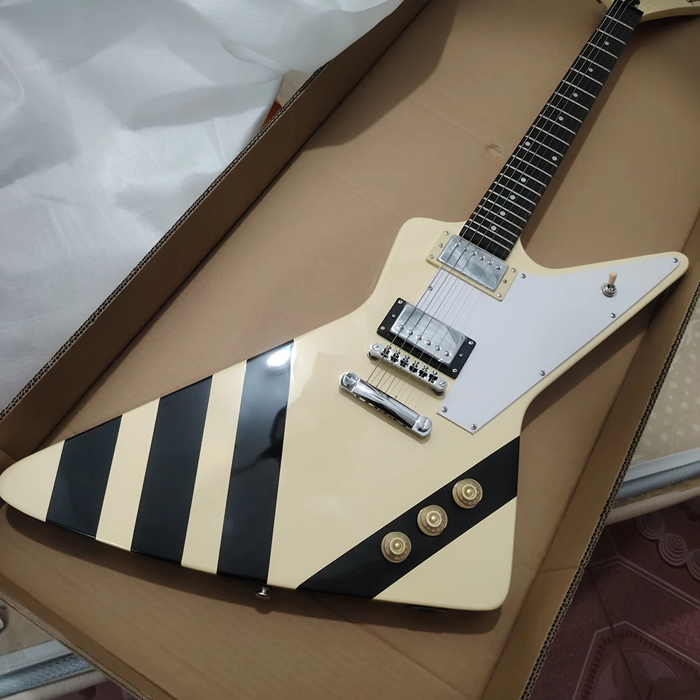 High quality milky yellow shaped electric guitar with black lines on the body, available for quick delivery