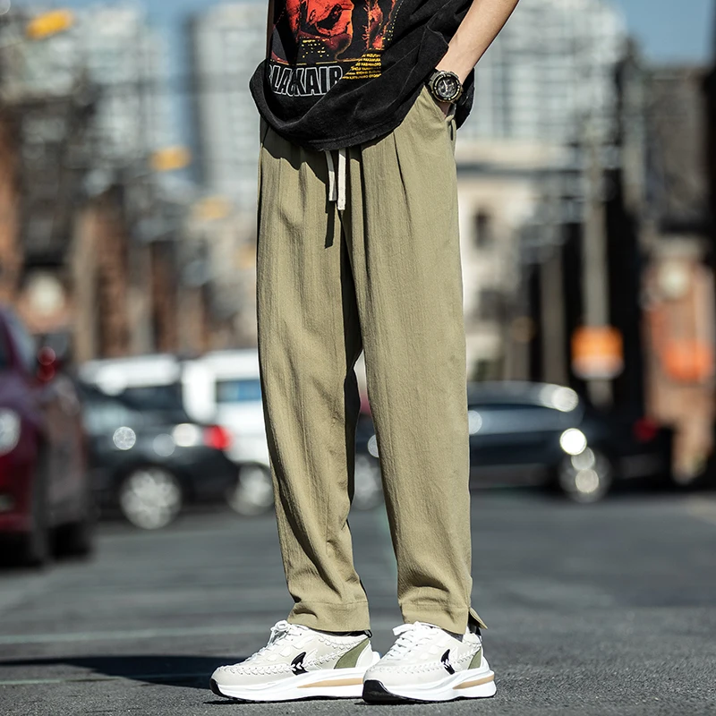 

Мужские повседневные льняные брюки весна-лето, универсальные, свободного прямого кроя, с разрезами, широкие штанины, модный бренд