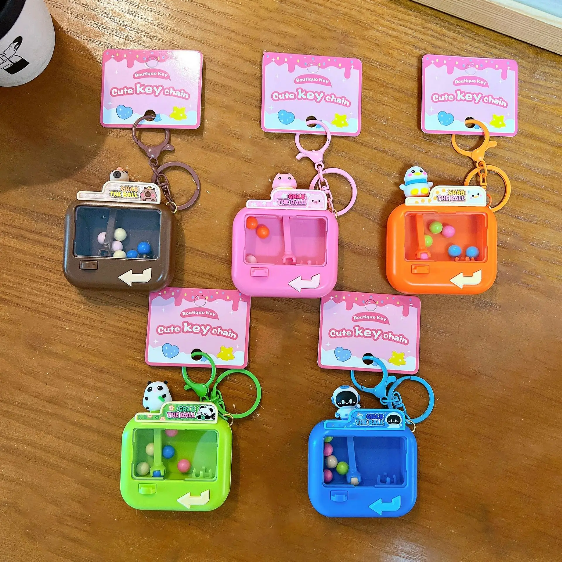 Mini Claw Machine Toy Keychain for Kids Portable Arcade Game Parent‑Child Interactive Grabber Machine Keyring Birthday Gift