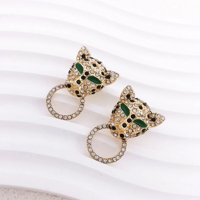 

Recommended By Miss Jenny Fashionable and Noble Metallic Color Designer Leopard Head Lady Earrings Party Gift Jewelry