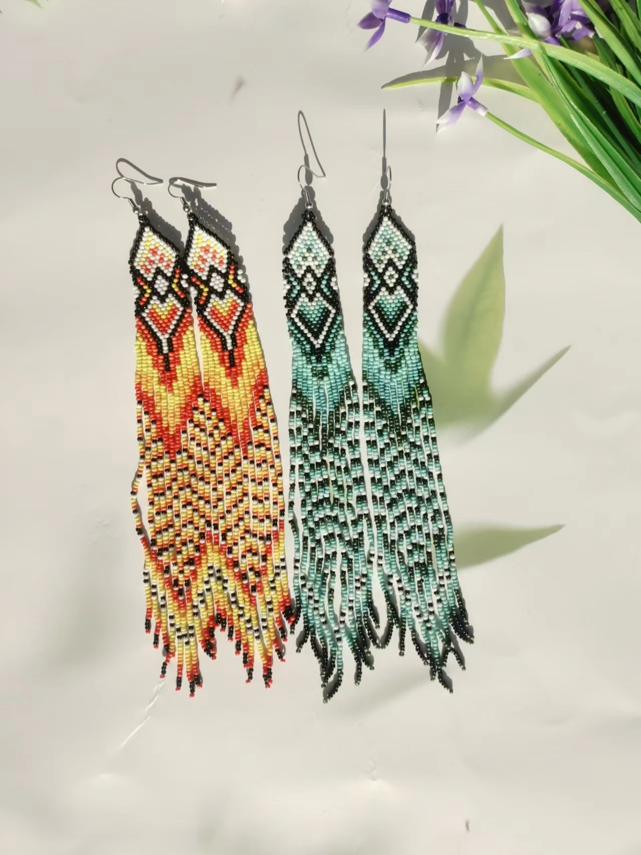 

Beaded earrings Tassel Geometry Gradient Originality Hand knitting Design Bohemia Alloy Tide Simple Rice bead earrings