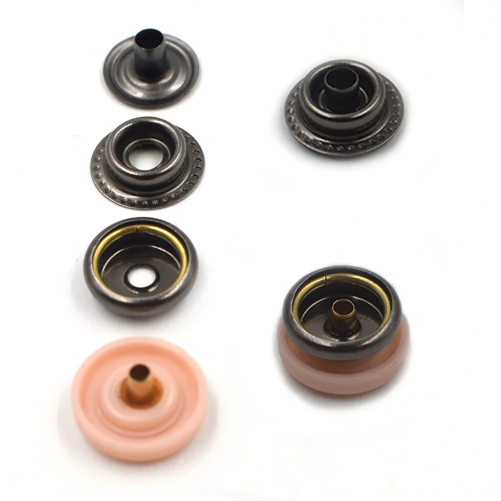 20sets buttons with 2 manual tools, fastener hammer sticks,hole puncher,ring Spring type brass snaps,nylon cap,DIY accessories