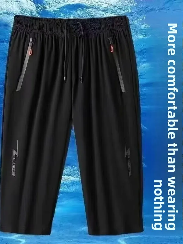 ผ้าไหมน้ําแข็งเจ็ดเท้ากางเกงผู้ชาย orts ฤดูร้อนบางหลวมสบายๆกีฬาขนาดใหญ่ยืดหยุ่น Qui-Drng กางเกง Breathable Polye...