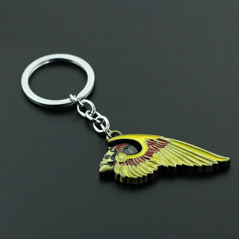 Outlaws Hot sales New Arrival Skeleton Wing Motorcycle Biker Clothing Hells Angels Pins Man Party Rock Key chain Gift