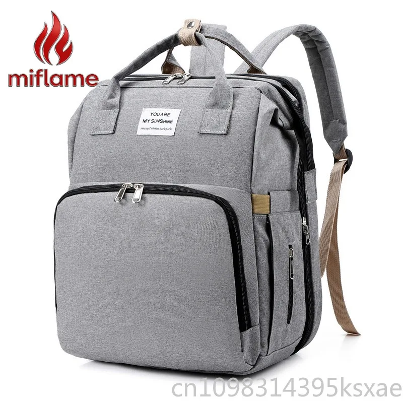 

Diaper Bag Luxury for Moms with Foldable Baby Bed Large Capacity Purse Handbag Backpack Style Travel and Daily Use