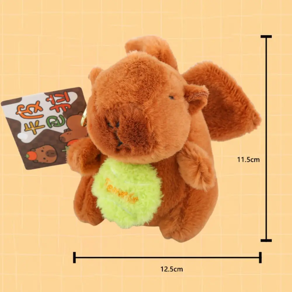 กระพือปีก Capybara ดึงของเล่นปุยน่ารักสัตว์ Capybara ดึงพวงกุญแจลูกเทนนิสการ์ตูน