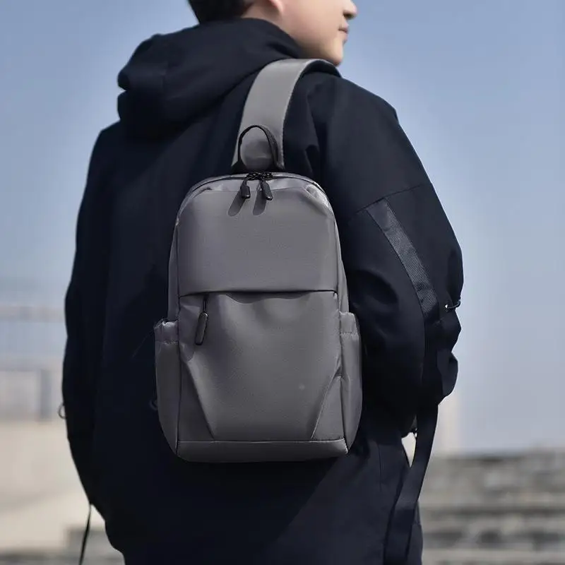 カジュアルレザークロスボディバッグ男性用トラベルショルダーバッグ軽量スリングバッグファッショナブルな学生バッグレジャーチェストバッグ