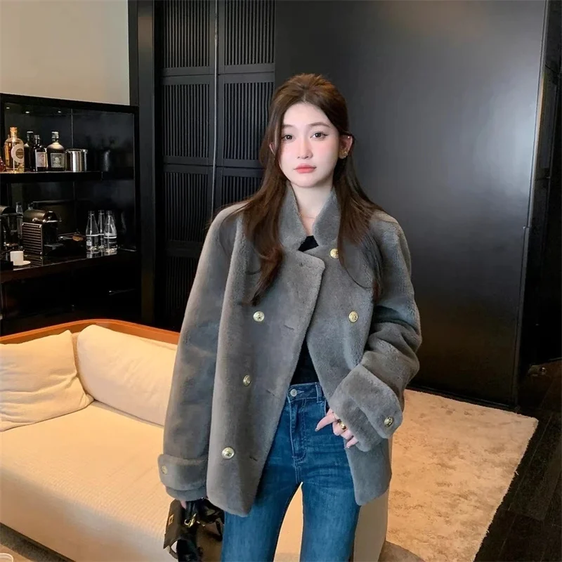Fur and fur Integrated Winter Imitation Sheep Shearing fur Coat Stand Collar Thick Style fur Coat Women High-end Jacket Hot Item