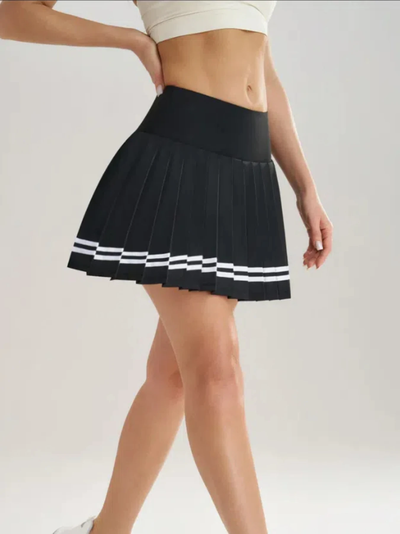 تنورة مطوية 2 في 1 تنورة تنس مع جيوب داخلية منتفخة شريطية عالية الخصر ملابس رياضية خارجية سريعة الجفاف للياقة البدنية للنساء