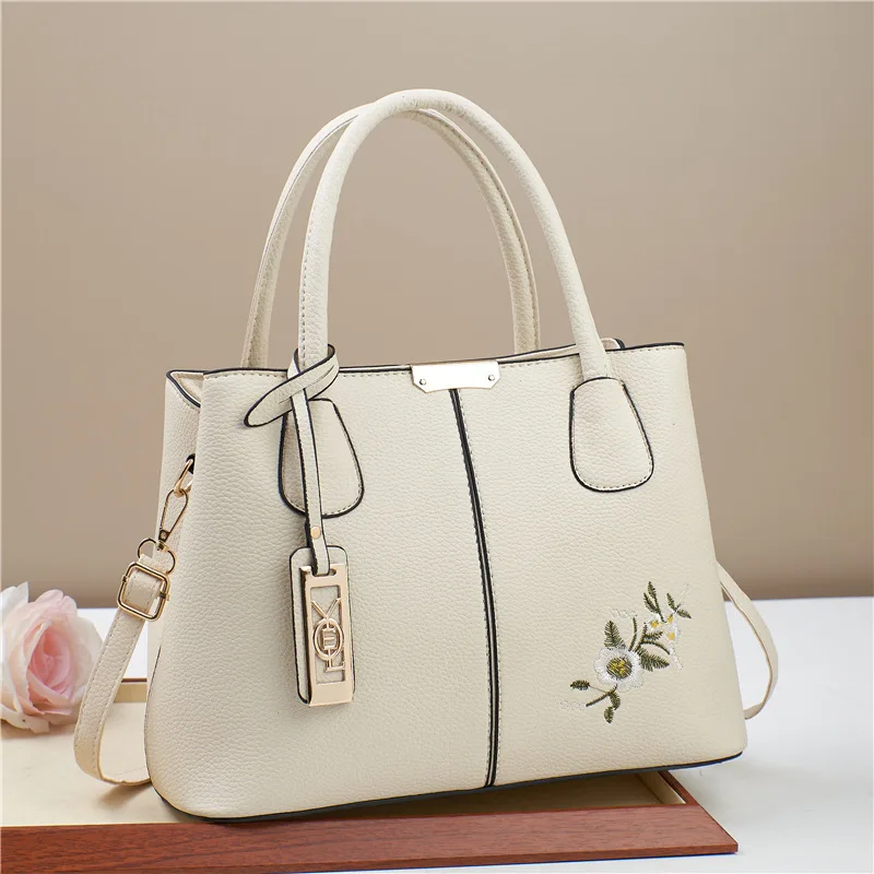 

2025 New Shoulder Crossbody Embroidery Flowers Fashion Trend Mom Simple Large Capacity Handheld Commuter Bag For Women