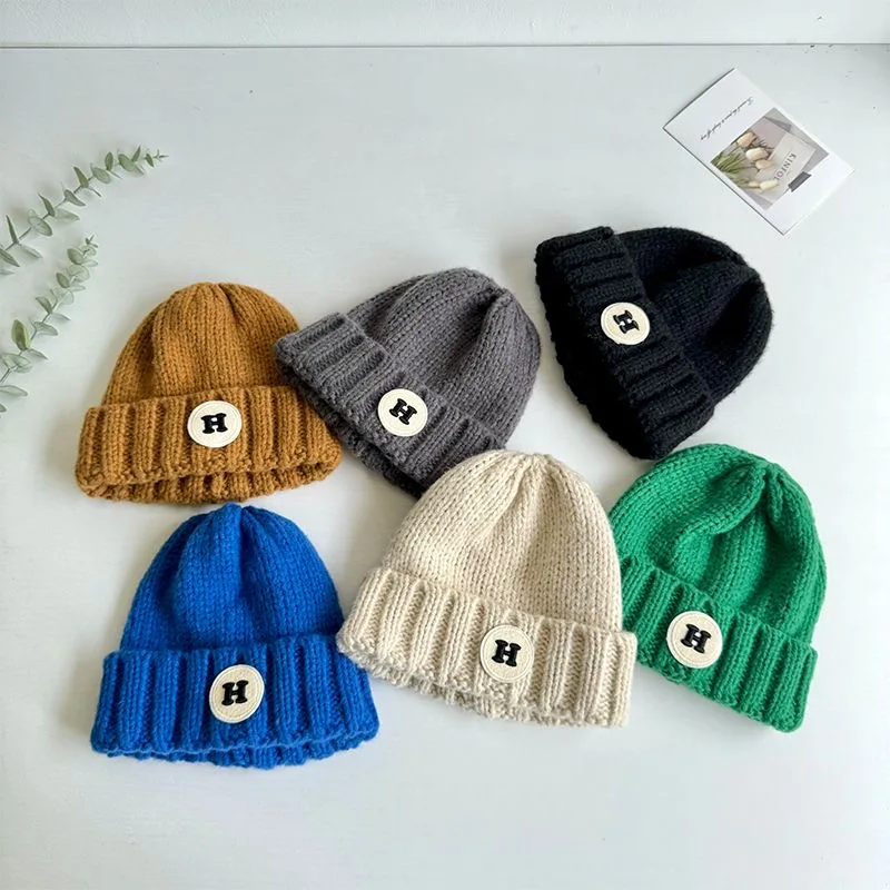 Children's hats winter boys warm single-layer wool cap baby Yangqi letters street dance knitted cap handsome tide cool