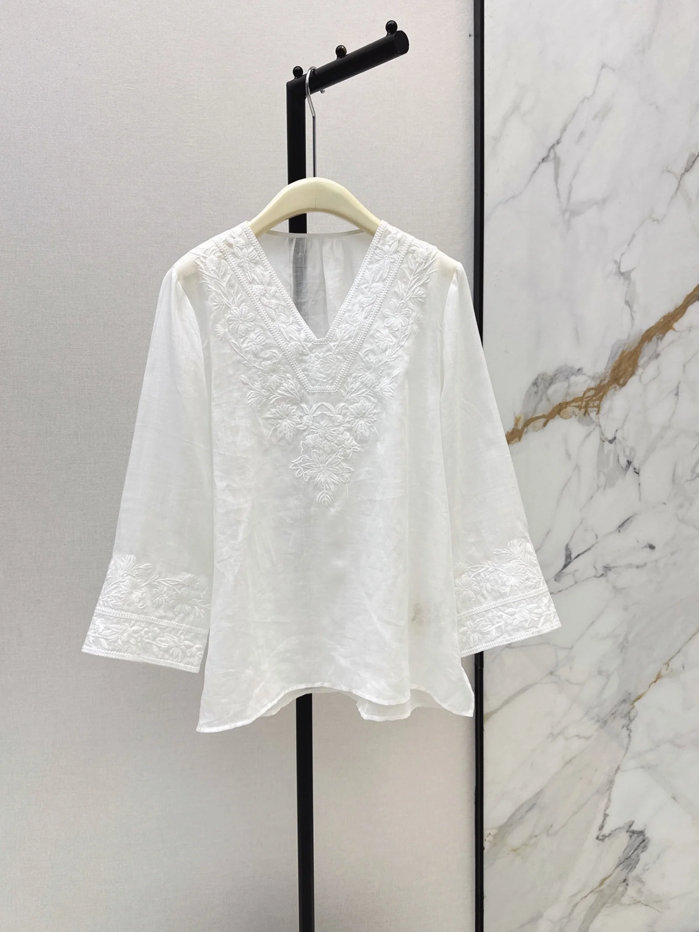 The latest heavy industry embroidered ramie V-neck top for early autumn 2026