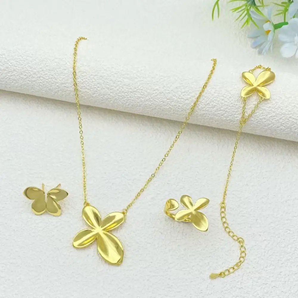 

Флора Минималистичный Элегантный Позолоченный Медный Комплект Ювелирных Изделий Офис Леди Повседневная Одежда Браслет Кольцо Ожерелье Серьги