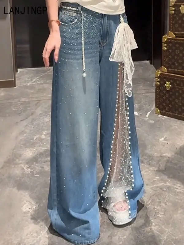 Mantianxing hot diamond mesh stitching heavy industry beaded jeans women's 2025 summer new drape wide-leg pants tide