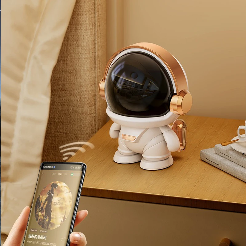 

New wireless robot subwoofer Bluetooth speaker outdoor gift TWS couplet cute desktop space Bluetooth astronaut astronaut speaker