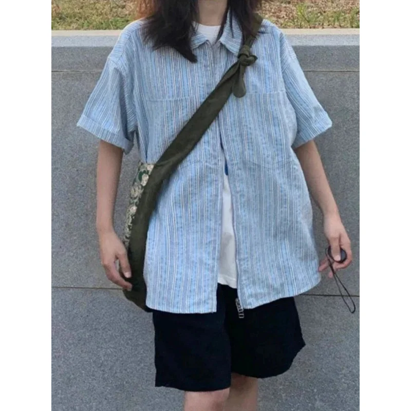 بلوزة نسائية صيفية فضفاضة مخططة بأكمام قصيرة موديل 2024 بجيب Y2k بلوزات جمالية تناسب كل مباراة قميص هاراجوكو ياباني غير رسمي على الموضة