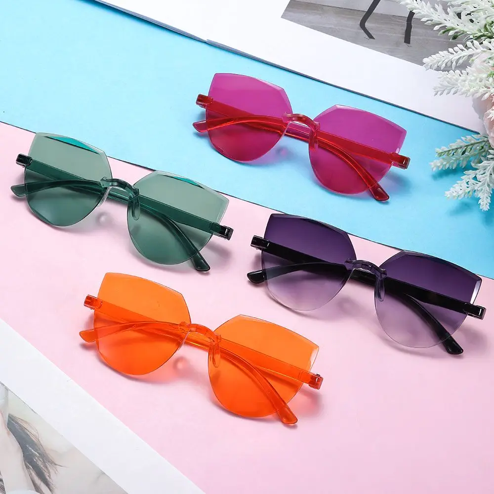 Retro Candy Color Trendy Transparent Rimless Sunglasses for Women Cat Eye Sunglasses Eyewear