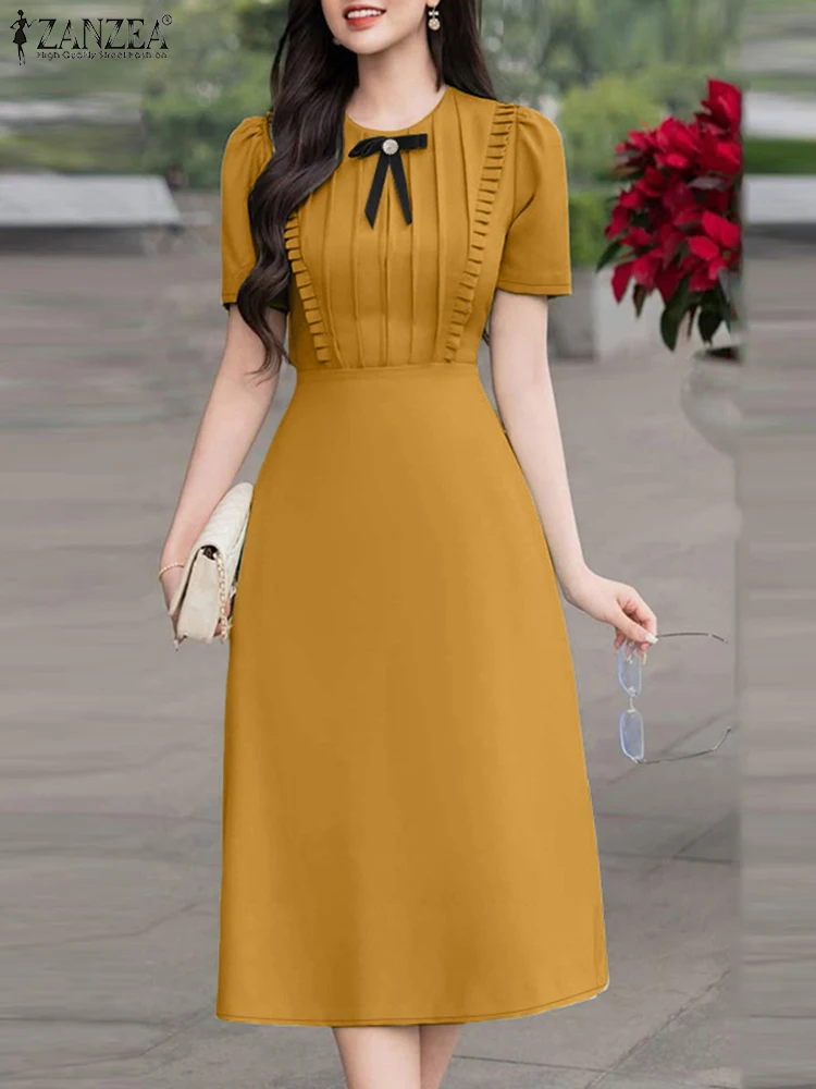 فساتين ZANZEA النسائية الأنيقة على شكل حرف a على شكل حرف a موضة صيف 2025 برقبة دائرية وأكمام قصيرة مكشكشة وتفاصيل فيونكة ميدي رداء نسائي